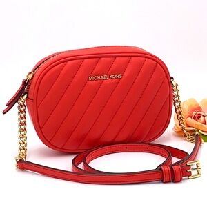 MICHAEL KORS ROSE SM OVAL CAMERA XBODY DR SANGRIA